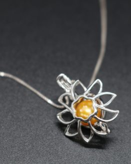 sterling silver sunflower locket holds one pearl