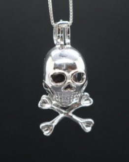 sterling silver skull and bones locket holds one pearl.