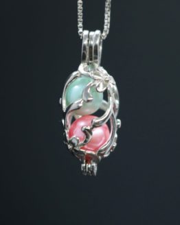 Sterling silver locket designed with wildflowers and vines