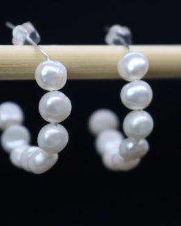 pearl earrings in crescent shape