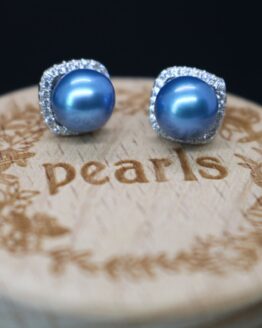 sterling silver pearl earrings surrounded by high quality cz's