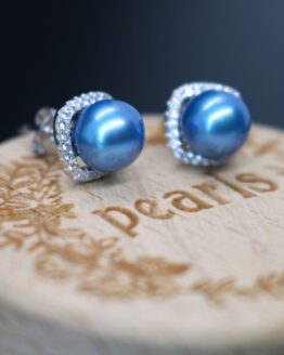 sterling silver pearl earrings surrounded by high quality cz's